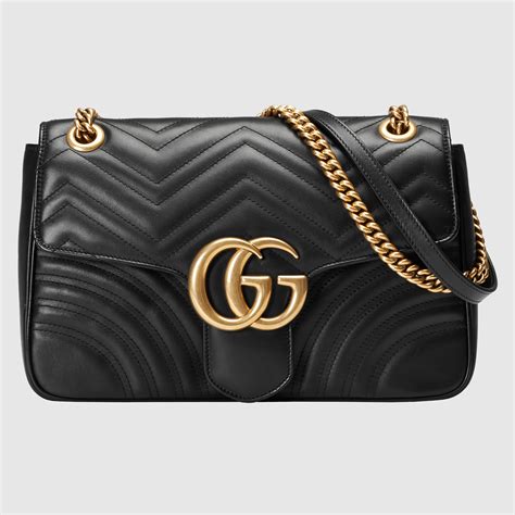 Gucci Borsa a spalla GG Emblem misura media